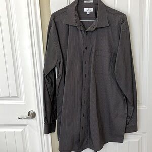 Size 19 ENRO tall man’s men’s dress shirt with 37–38 sleeve length.